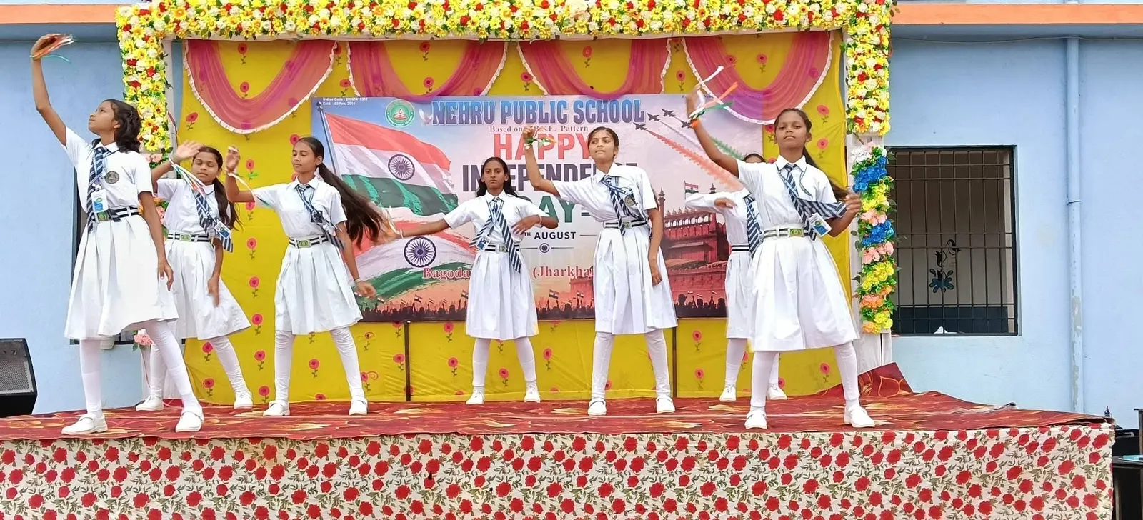 Students perform a patriotic dance on Independence Day